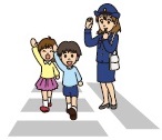 道路を渡る子どもを見守る女性警察官